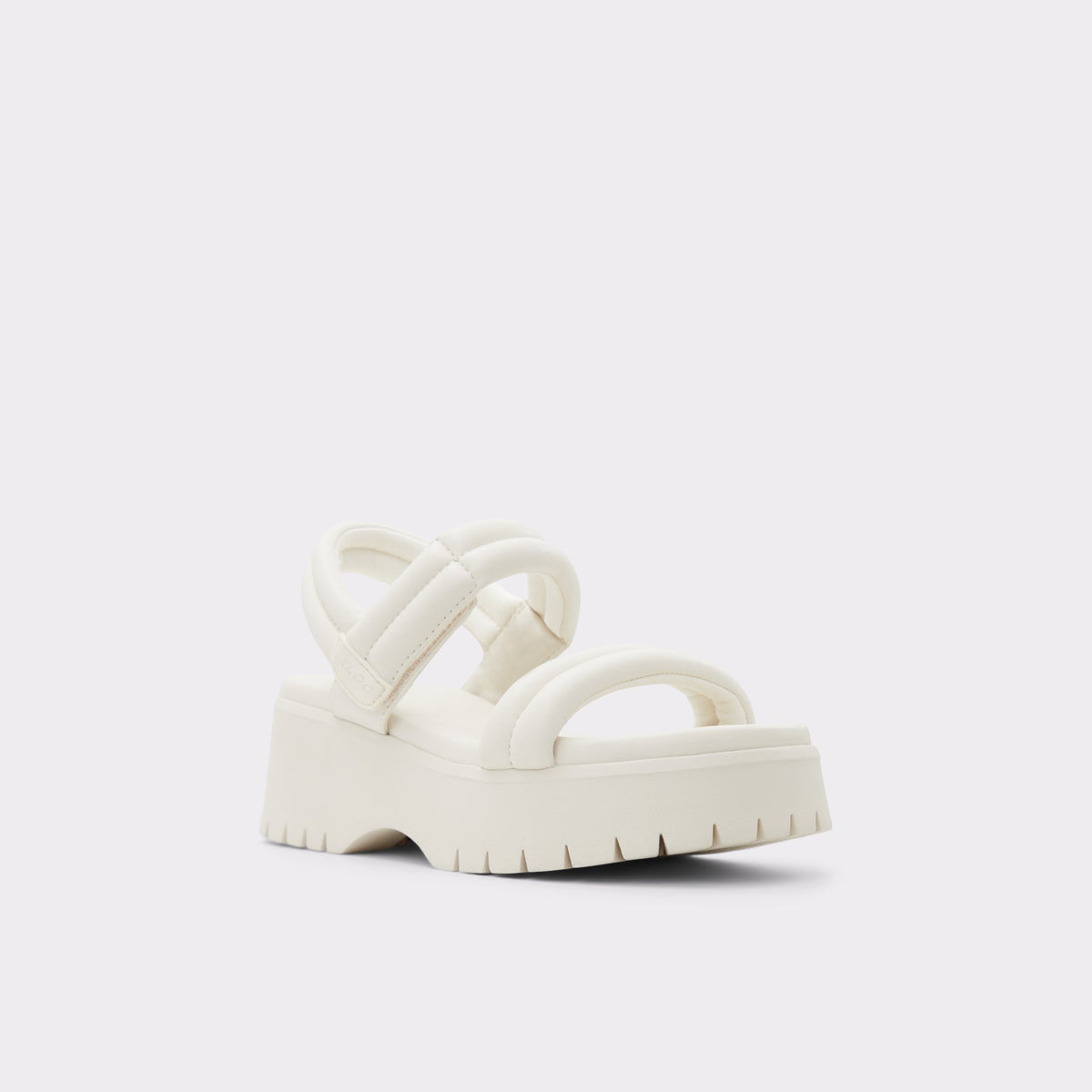 Three-quarter angle of White Mcguire Wedge sandal's front side