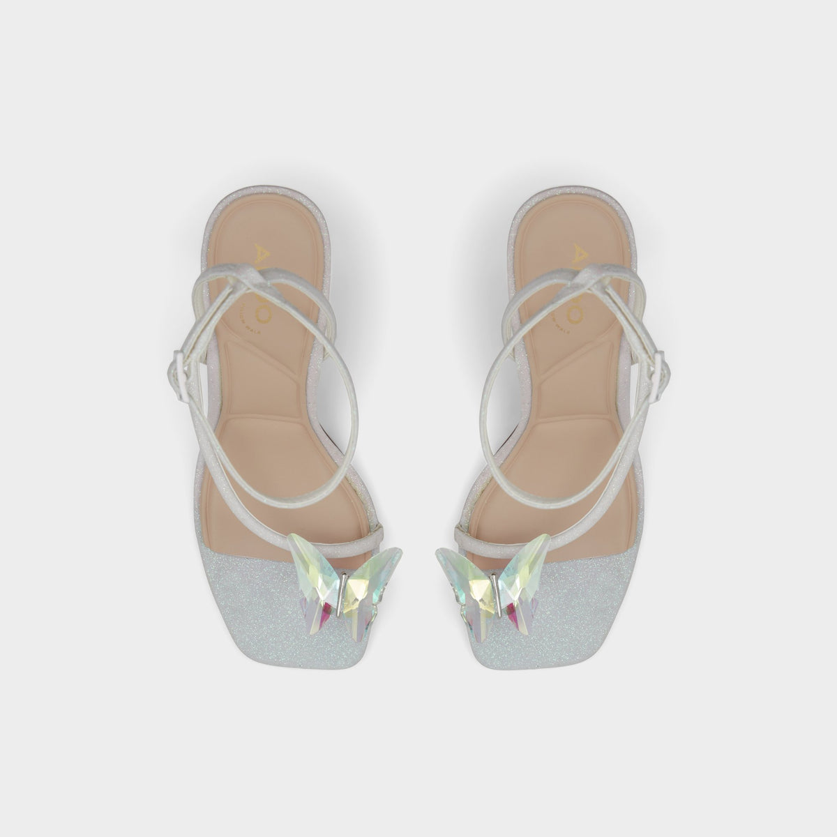 Top-down view of the White Pepela Strappy heeled sandal