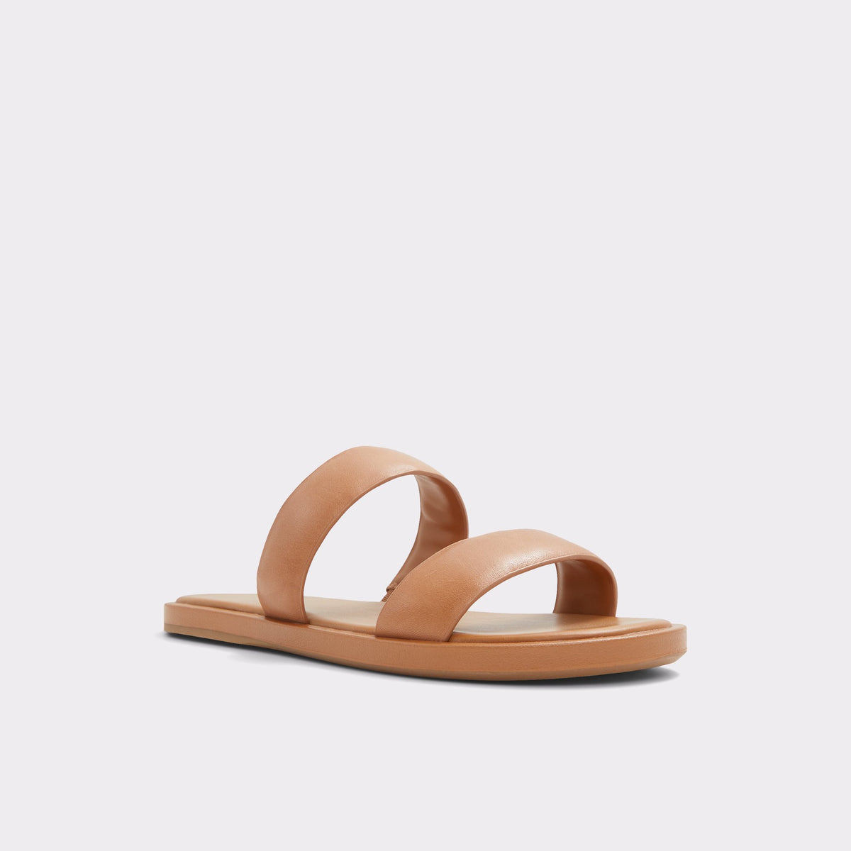 Three-quarter angle of Dark Beige Krios Strappy flat sandal's front side