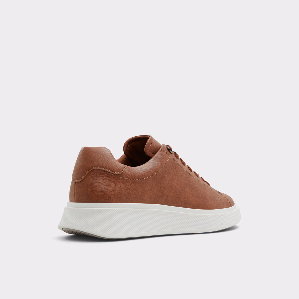 Three-quarter angle of Light Brown Magnus Low top sneaker's back side