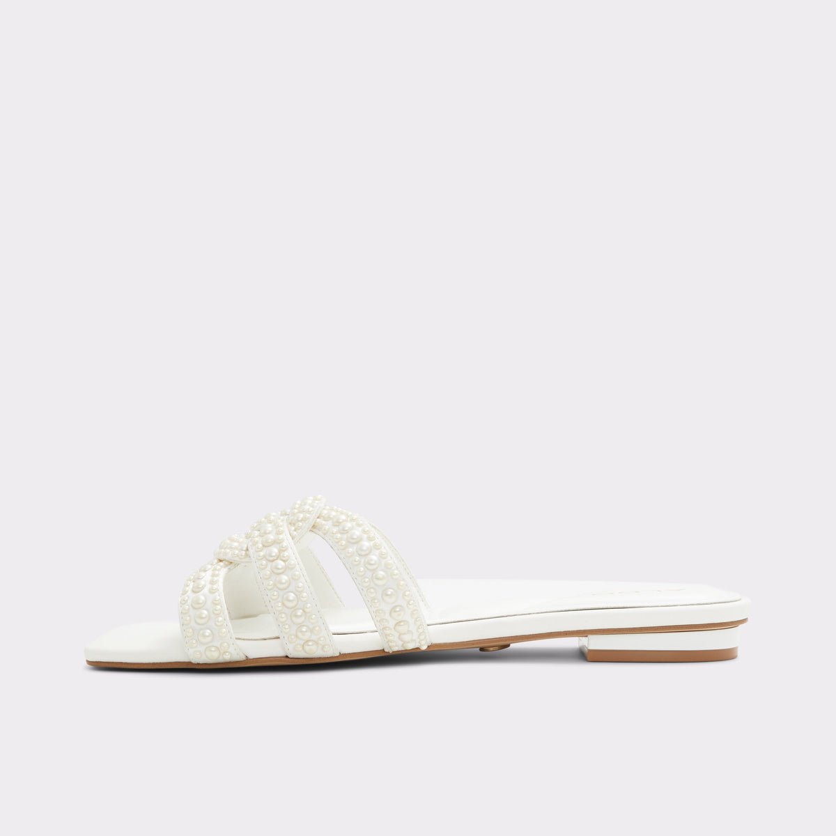 Side view of White Lilu Slide sandal