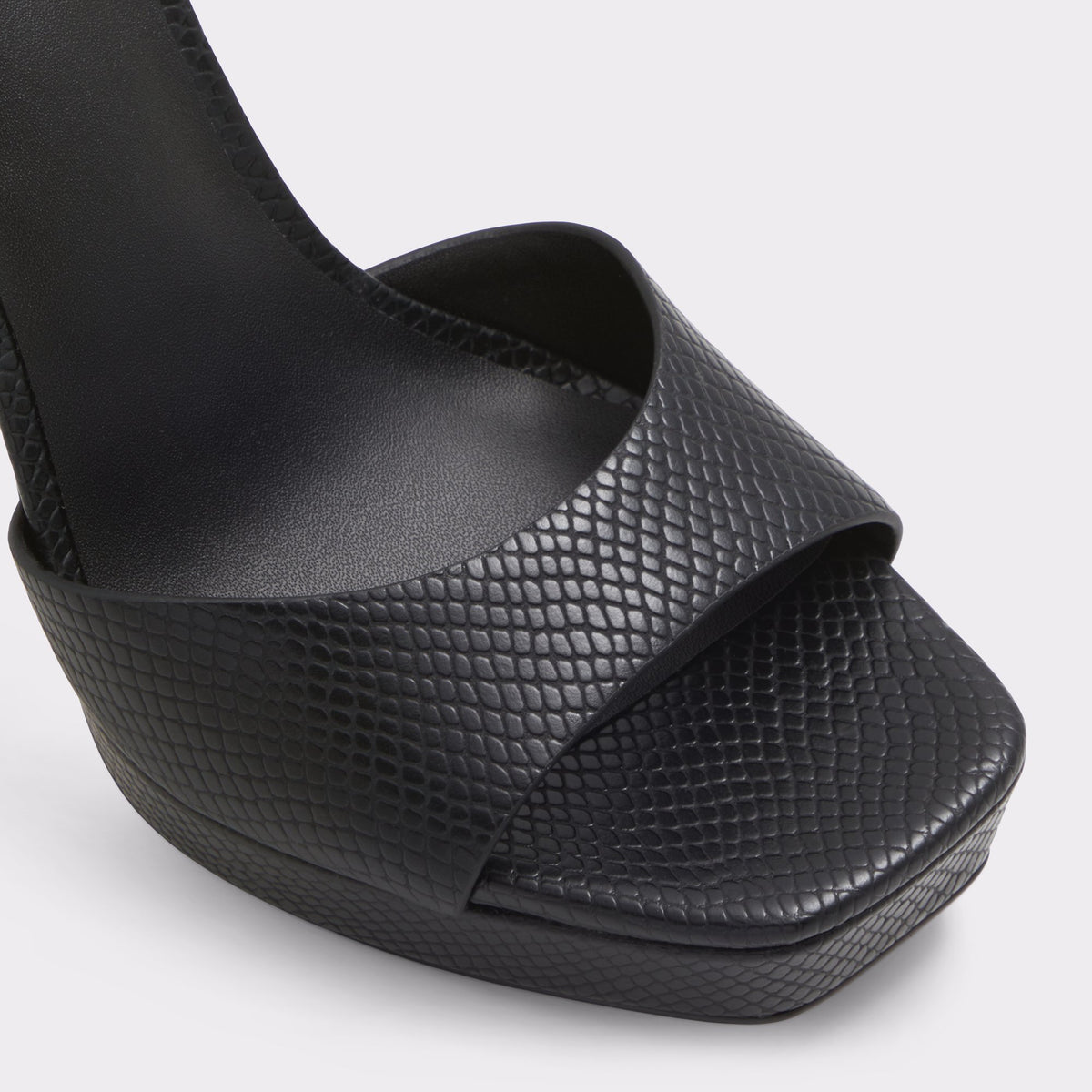 Close-up of the Other Black Prisilla Black strappy sandal