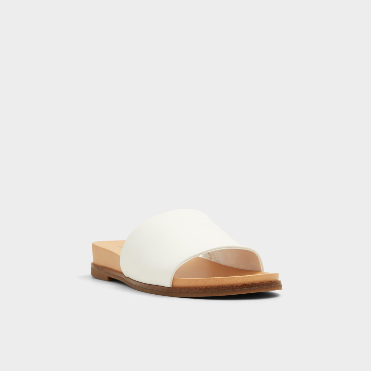 Three-quarter angle of White Elina Slide sandal's front side
