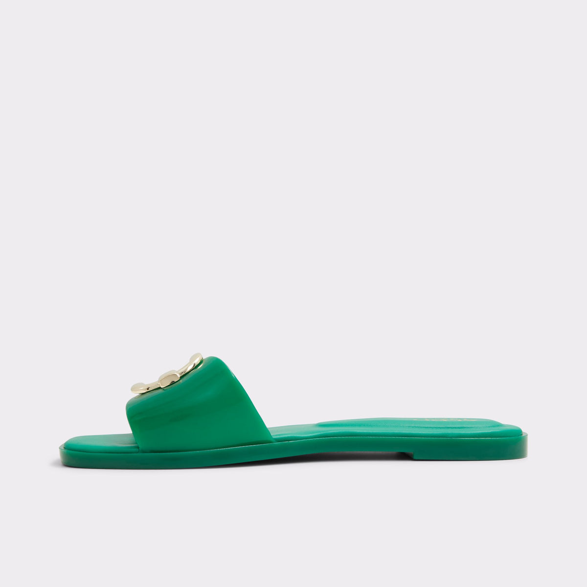 Side view of Medium Green Jellyicious Slide sandal &amp; tote bag