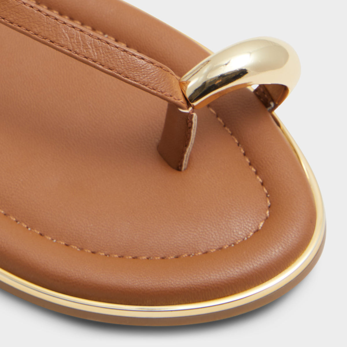 Close-up of the Medium Brown Jomali Strappy flat sandal