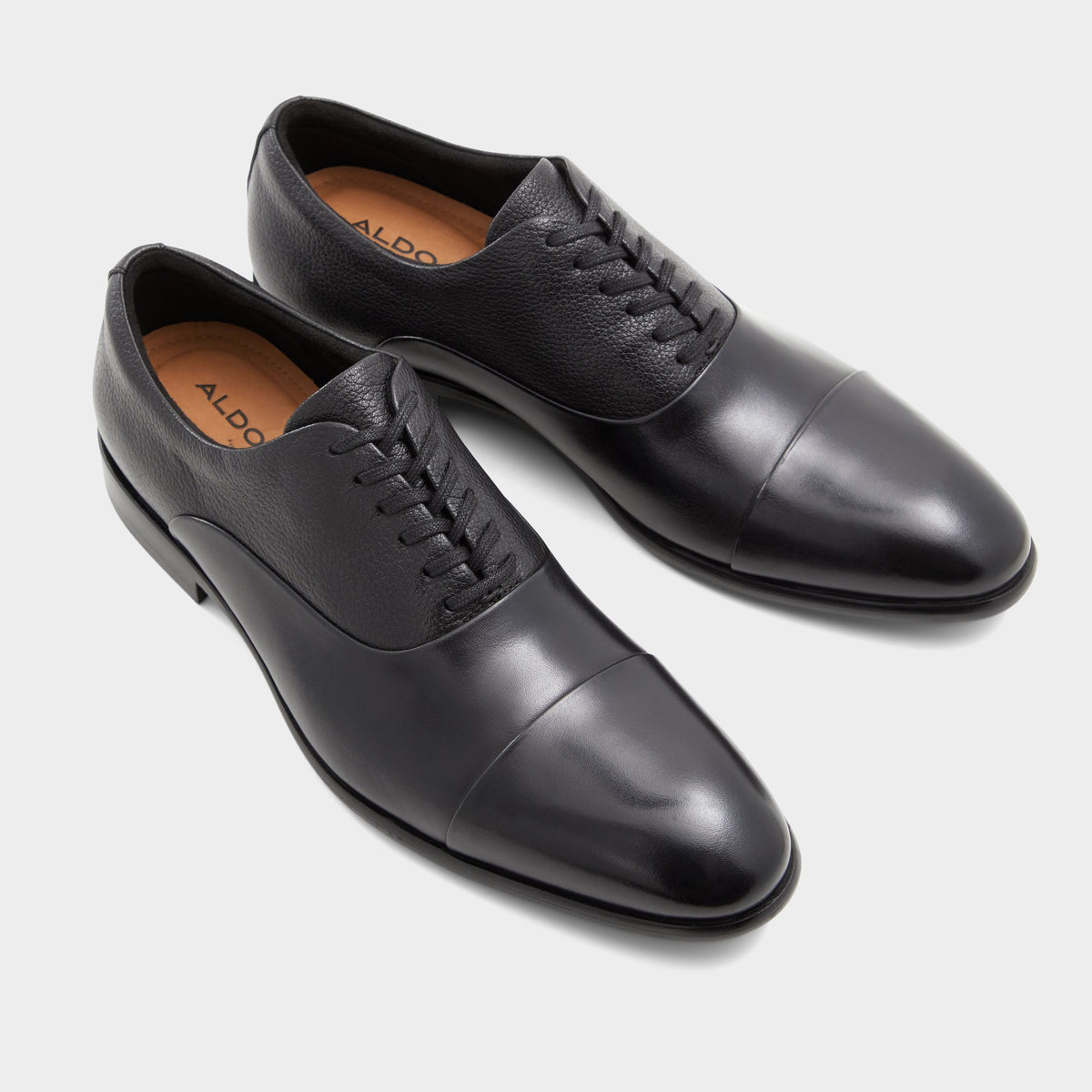 Highlighted view of a pair of Open Black Meekes Oxford shoes