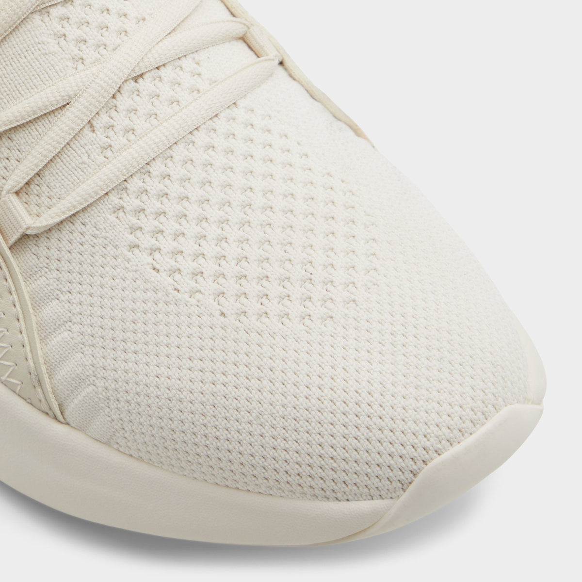 Close-up of the White/Bone Motionx Jogger sneaker