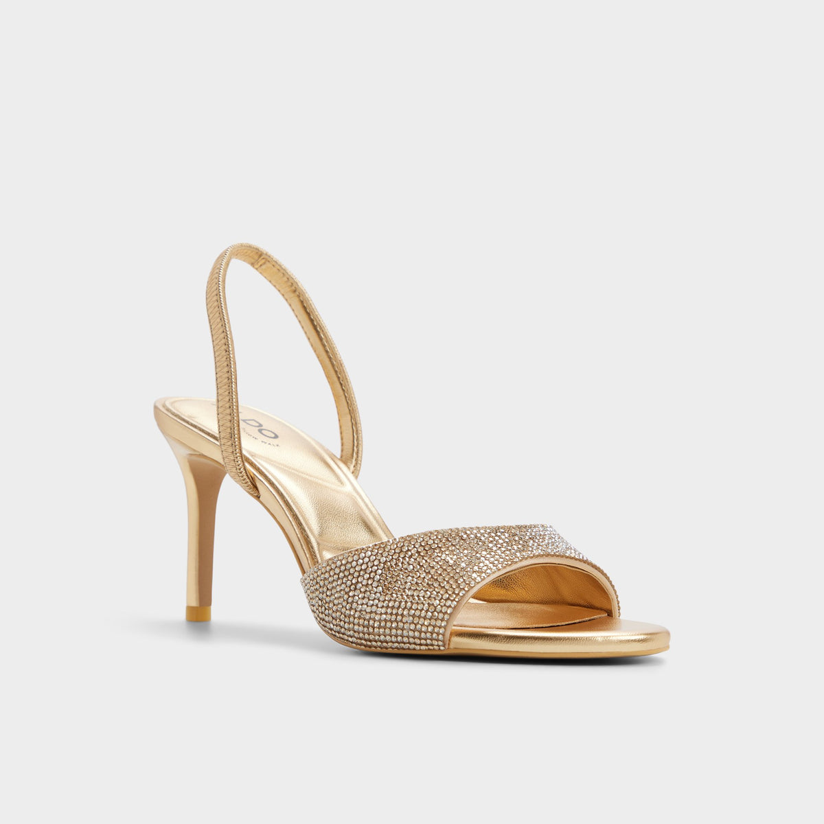 Three-quarter angle of Gold Aitana Slingback heeled sandal's front side