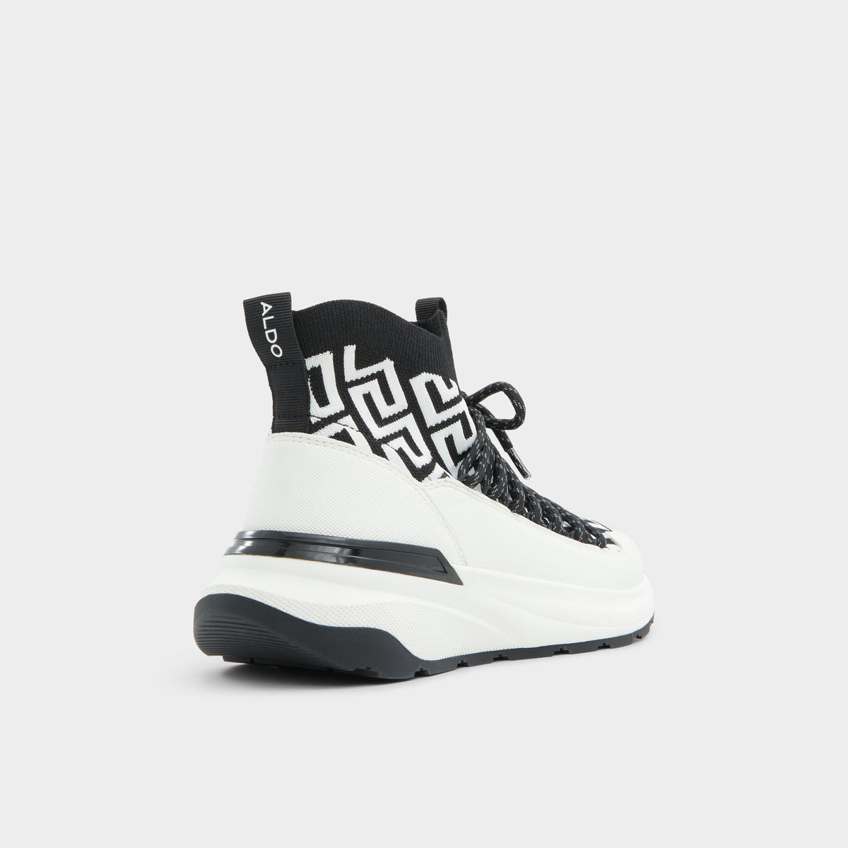 Three-quarter angle of White/Black Everlynn Jogger sneaker's back side