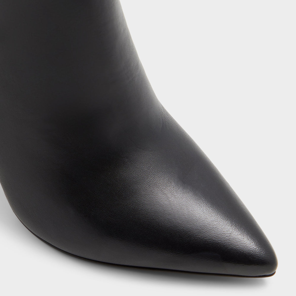Close-up of the Black Electro Block heel knee-high boot