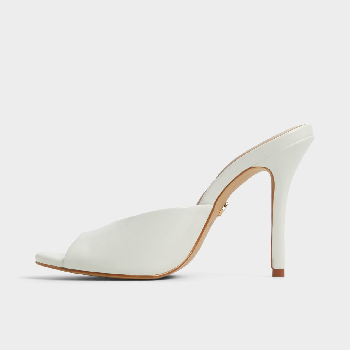 Side view of White/Bone Fidelia Heeled mule