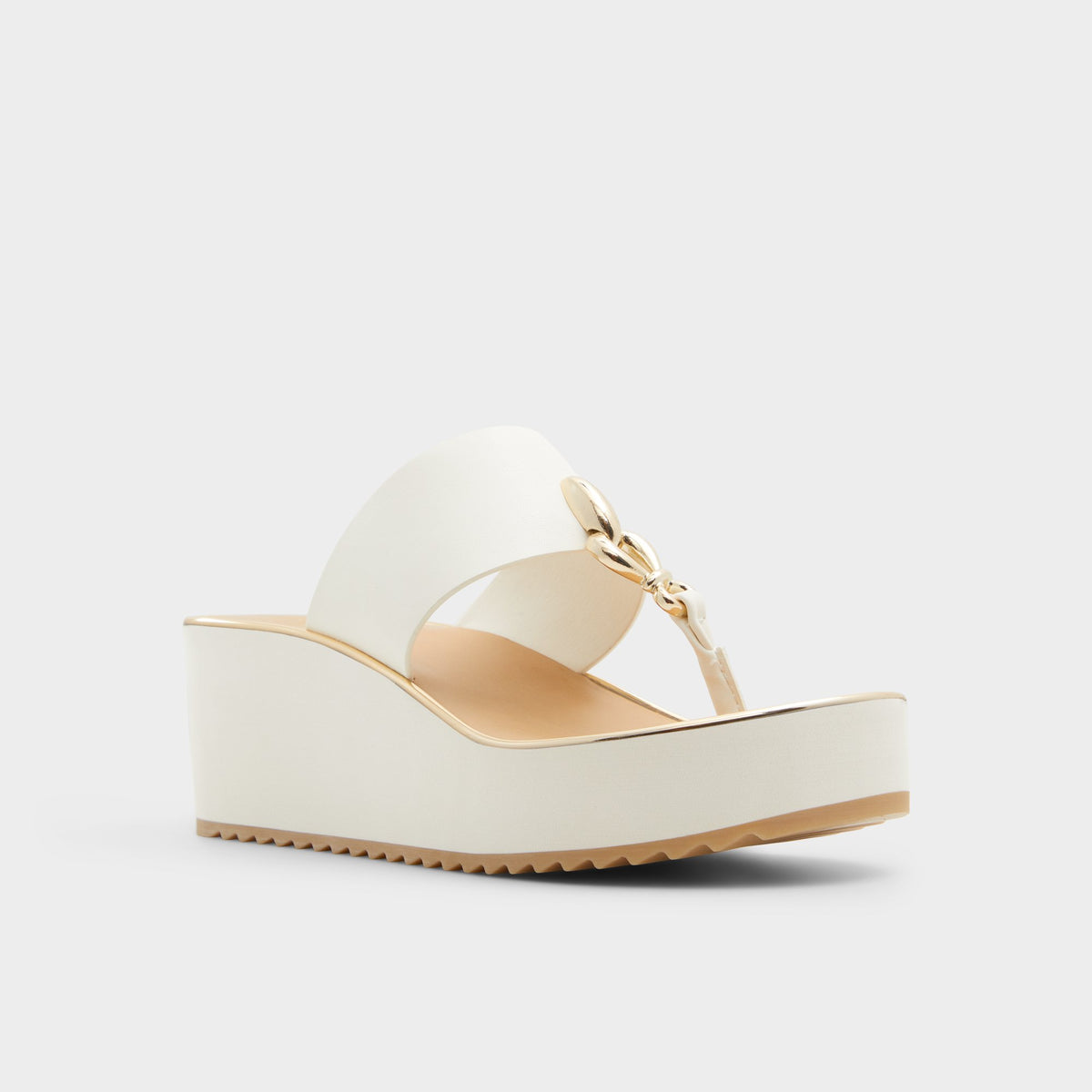 Three-quarter angle of White Penelopy T-strap sandal's front side