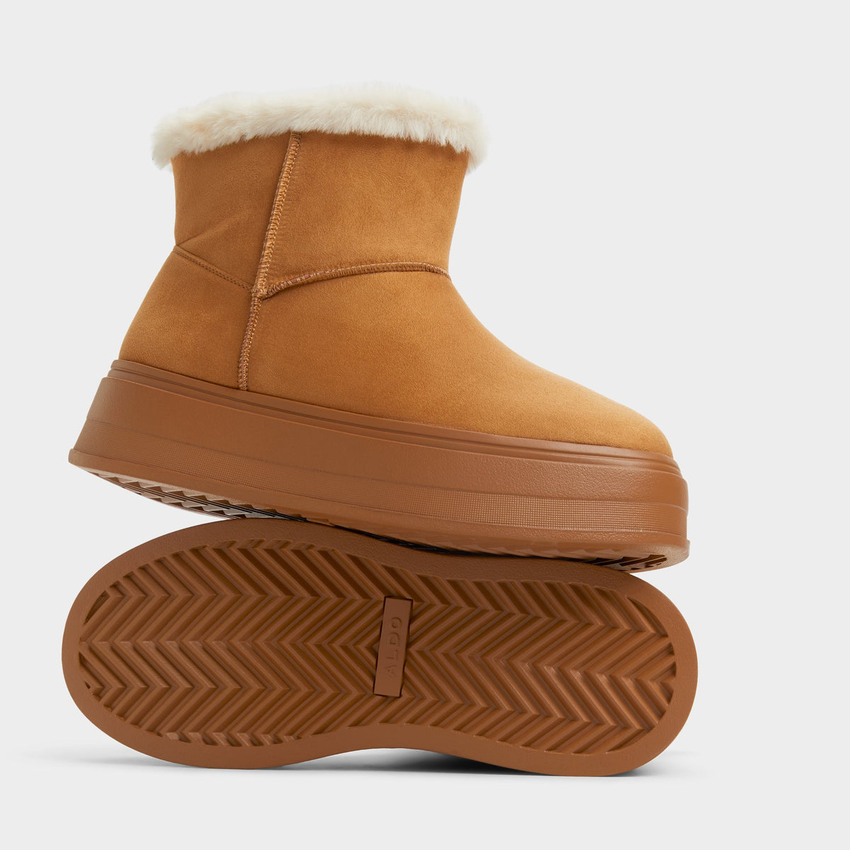 Highlighted view of a pair of Tan Plushy s