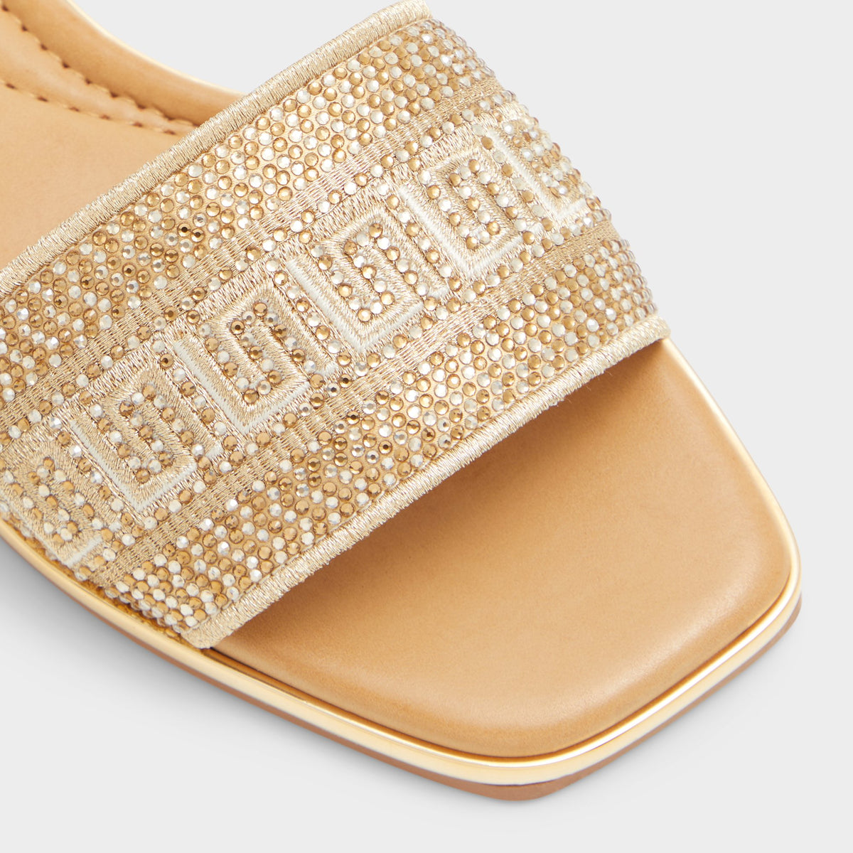 Close-up of the Gold Oceania-xt Slide sandal
