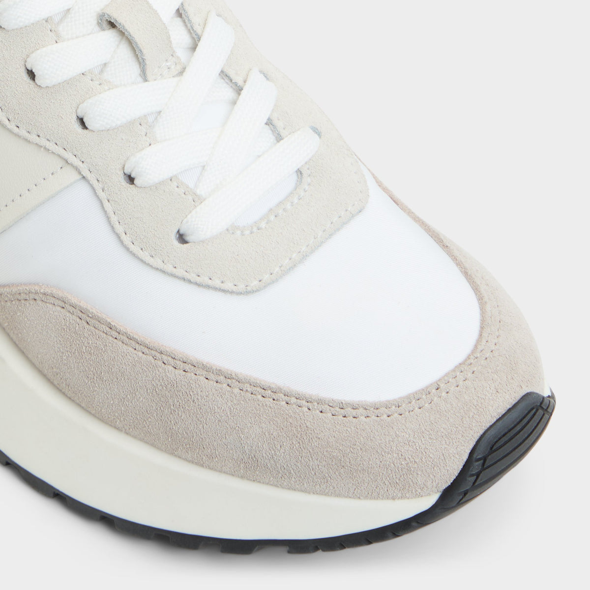 Close-up of the White/bone Proader Jogger sneaker