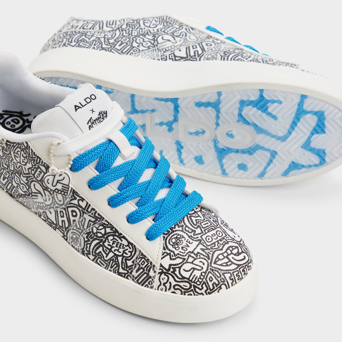 Highlighted view of a pair of White/Black Timothy Goodman Low top sneakers