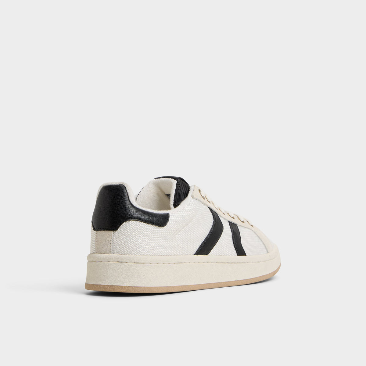 Three-quarter angle of White Retrokicks Low top sneaker's back side