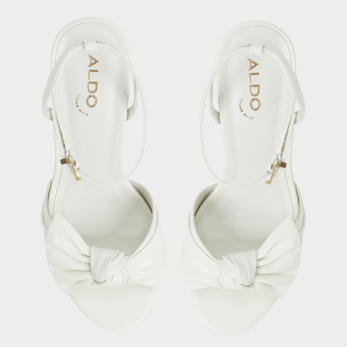 Top-down view of the White/bone Angelknot Strappy heeled sandal