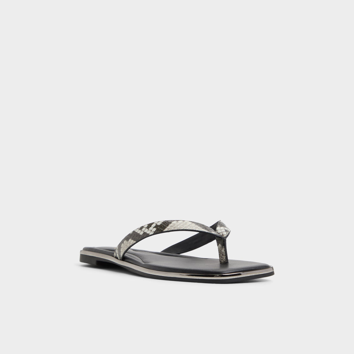 Three-quarter angle of White/black Theao Flip flop's front side