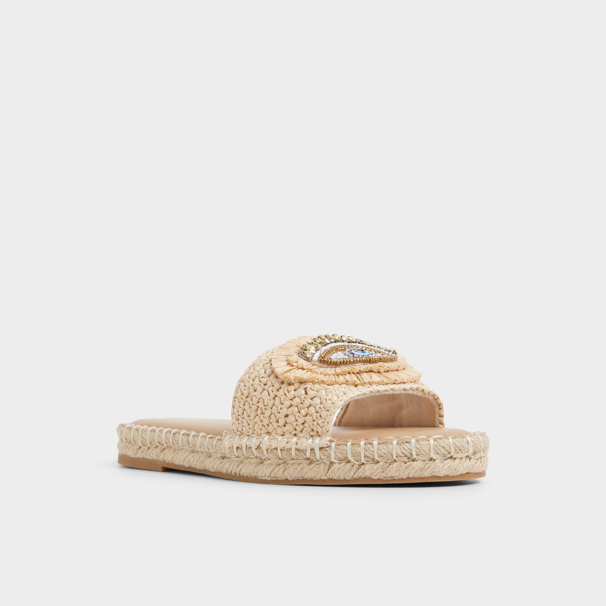 Three-quarter angle of Natural Nazar Slide sandal's front side