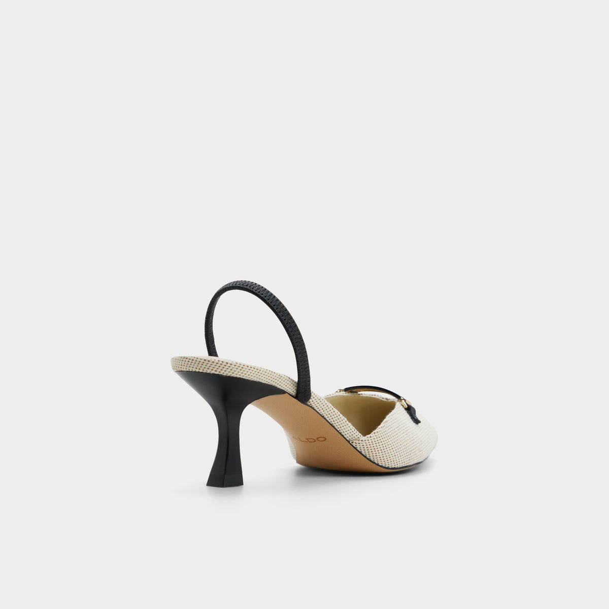 Three-quarter angle of Open natural Nailah Slingback kitten heel's back side