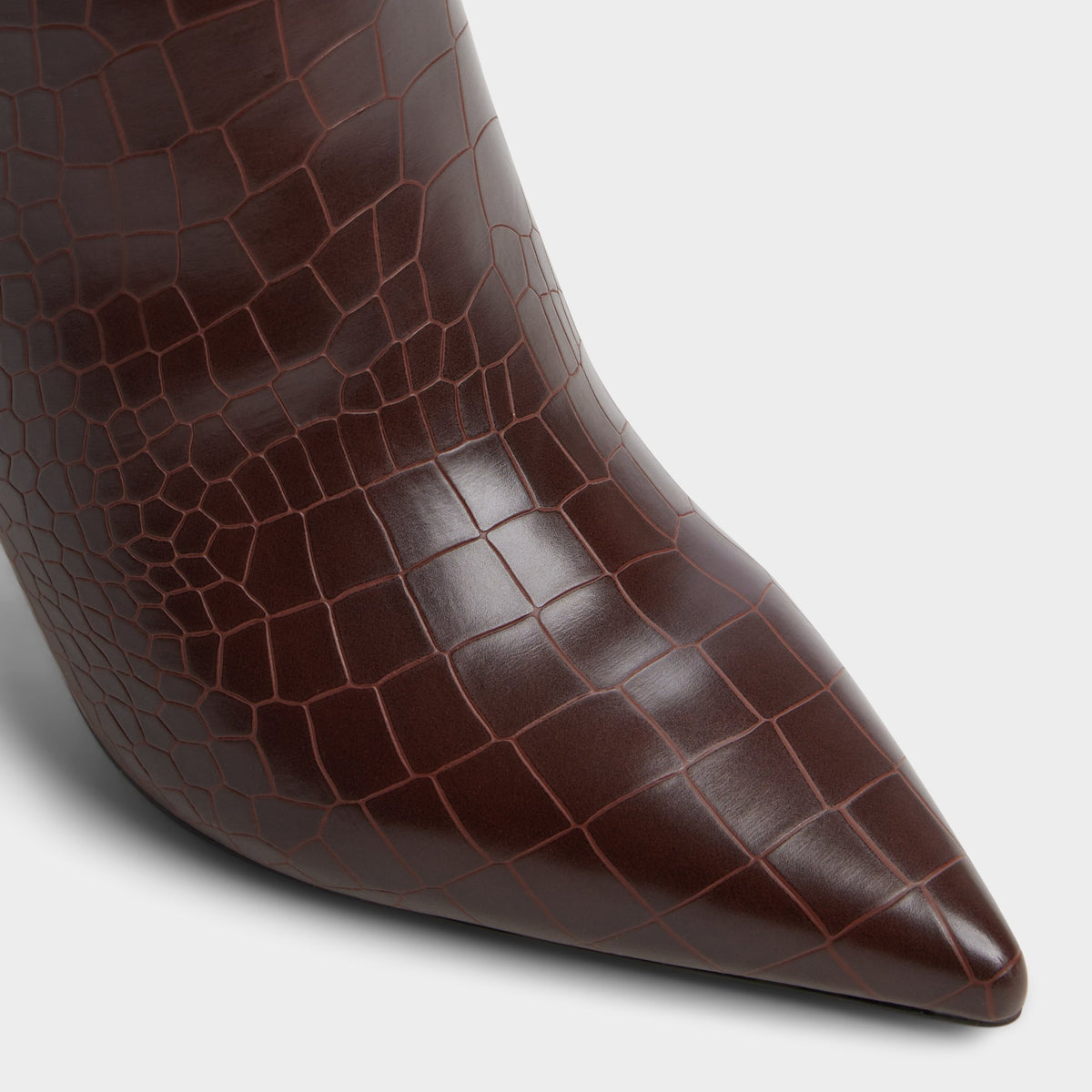 Close-up of the Dark brown Saphiria Stiletto heel knee-high boot