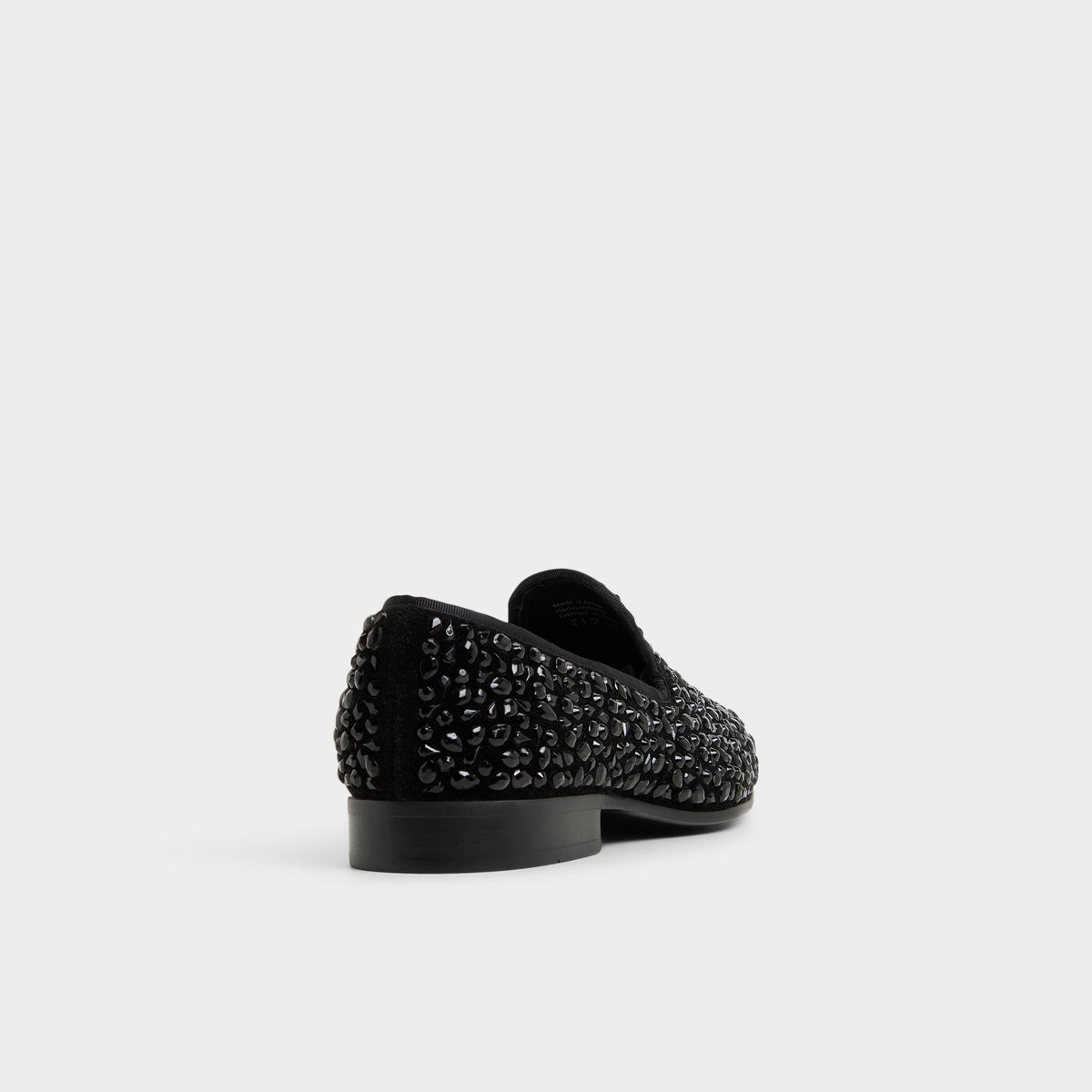 Three-quarter angle of Black Lux Loafer's back side