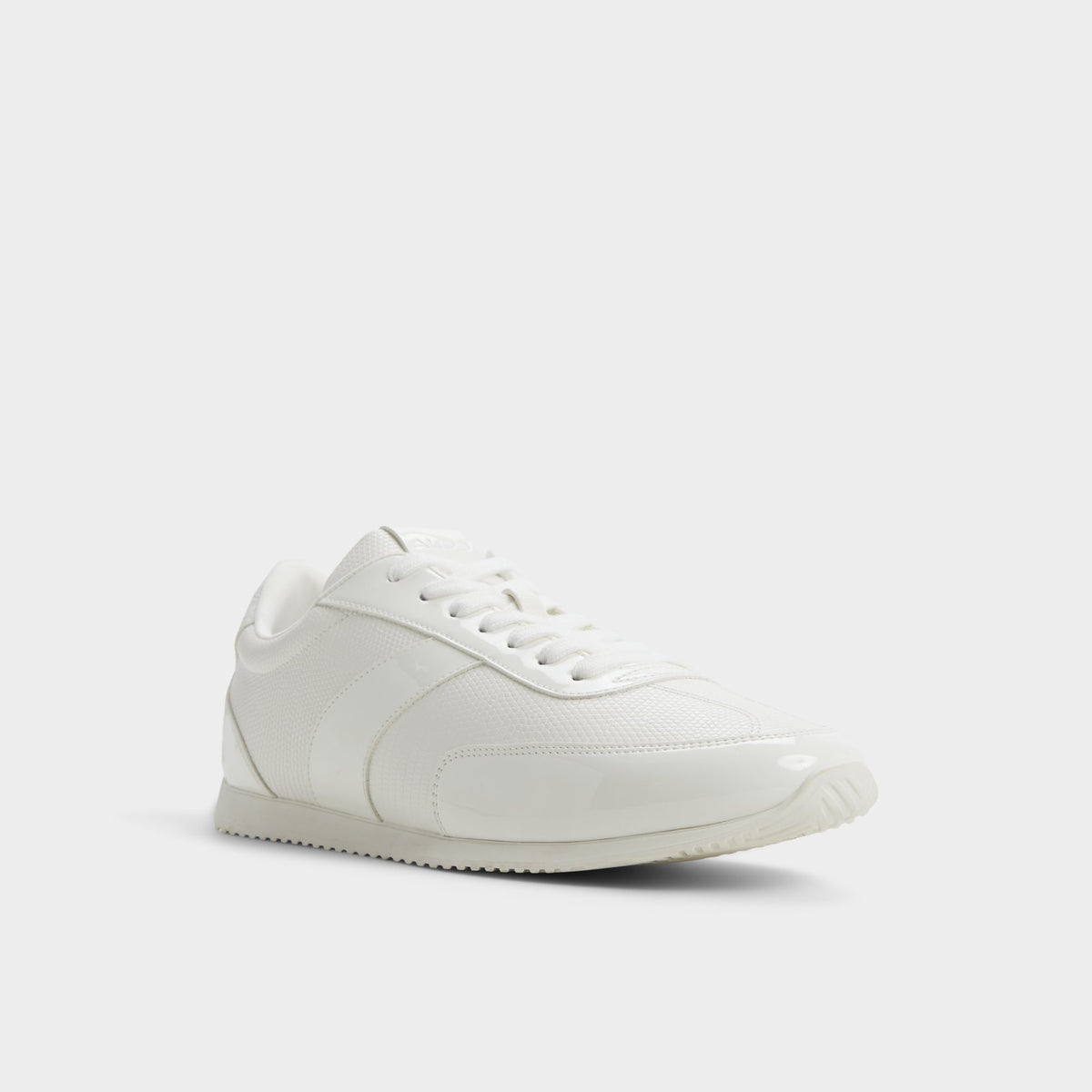 Three-quarter angle of White combo Nathaniel Low top sneaker's front side