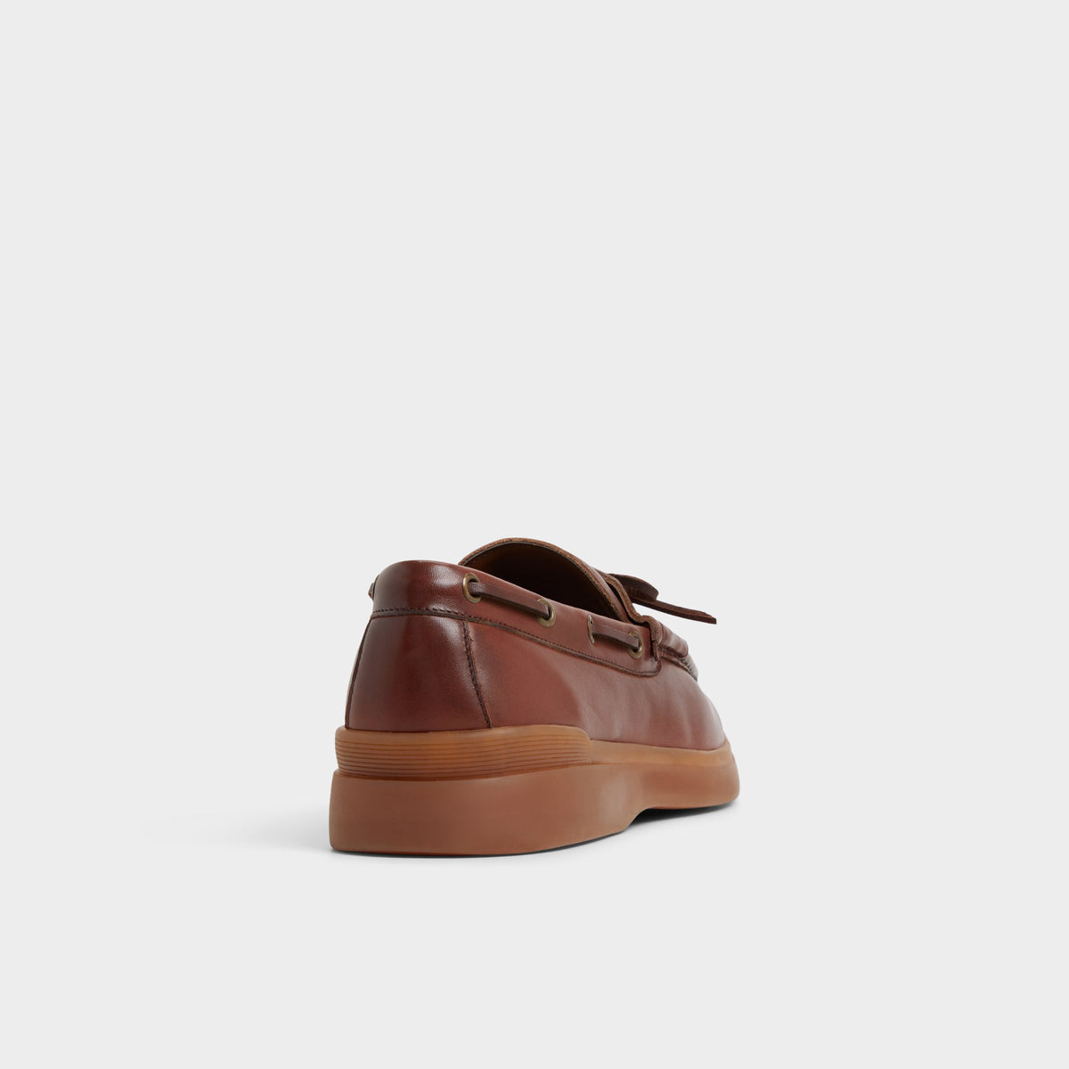Three-quarter angle of Brown overflow Bazzz Loafer's back side