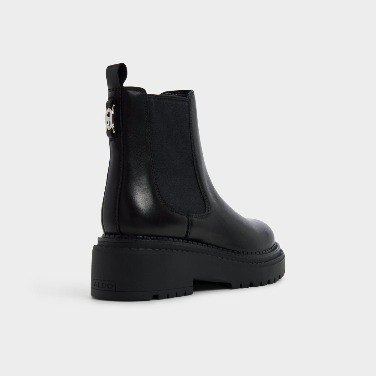 Three-quarter angle of Black Bestina Lug sole Chelsea boot's back side