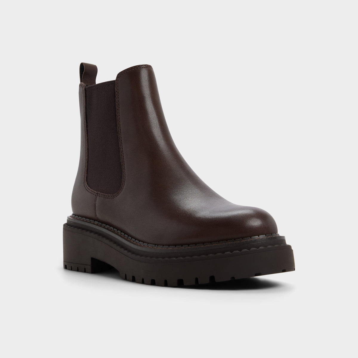 Three-quarter angle of Dark brown Bestina Lug sole Chelsea boot's front side