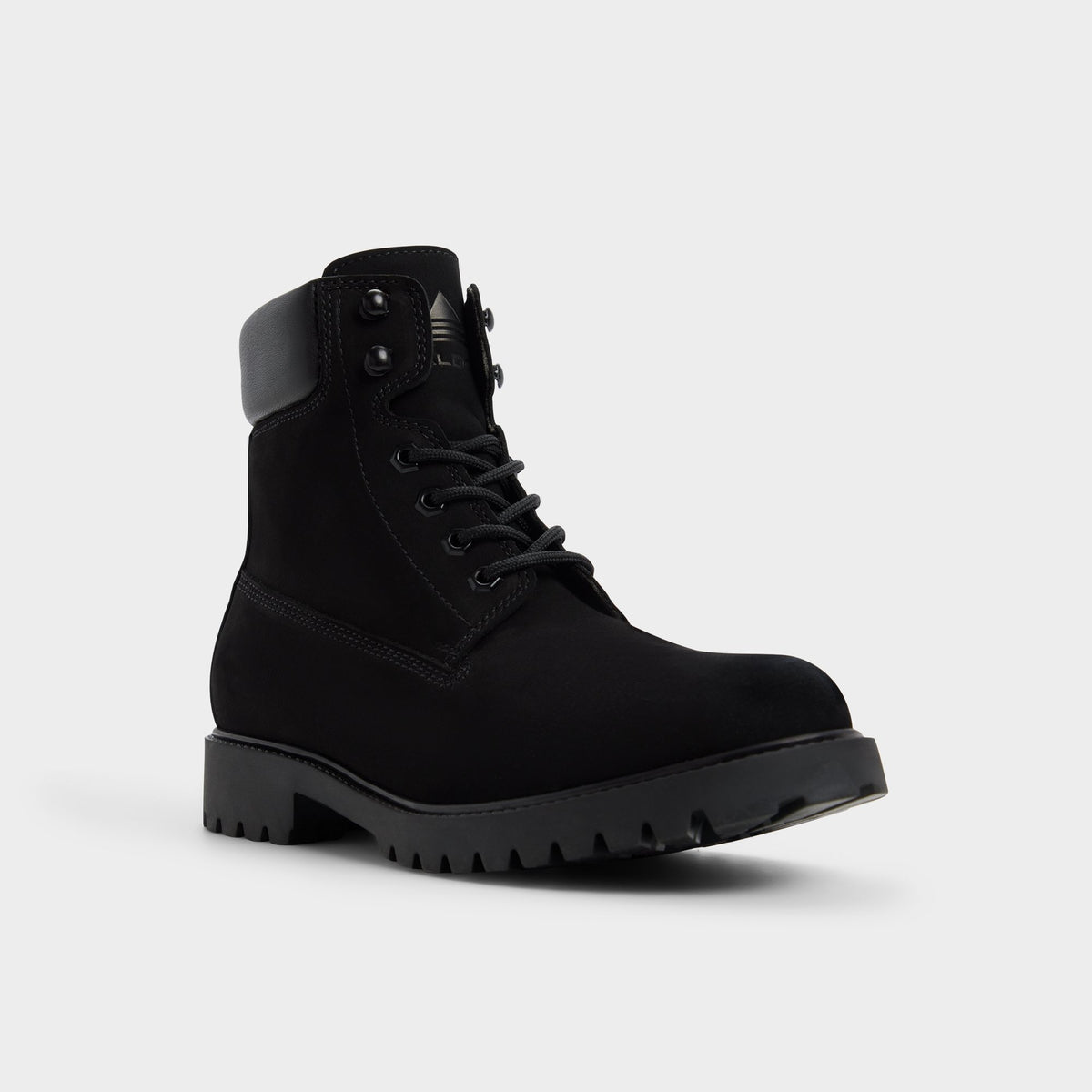 Three-quarter angle of Black Tavares Lace-up boot's front side