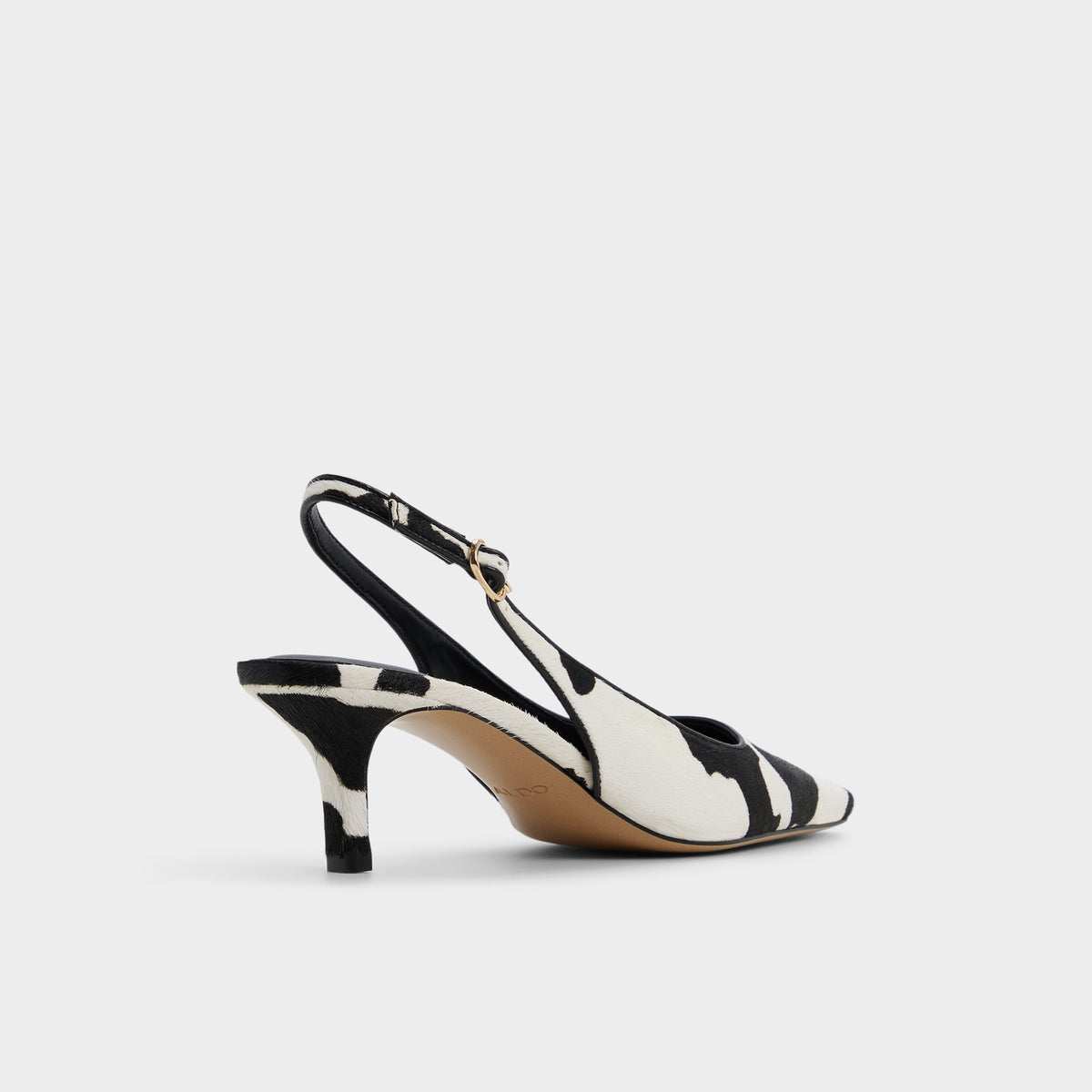 Three-quarter angle of White/black Gabriellie Slingback kitten heel's back side