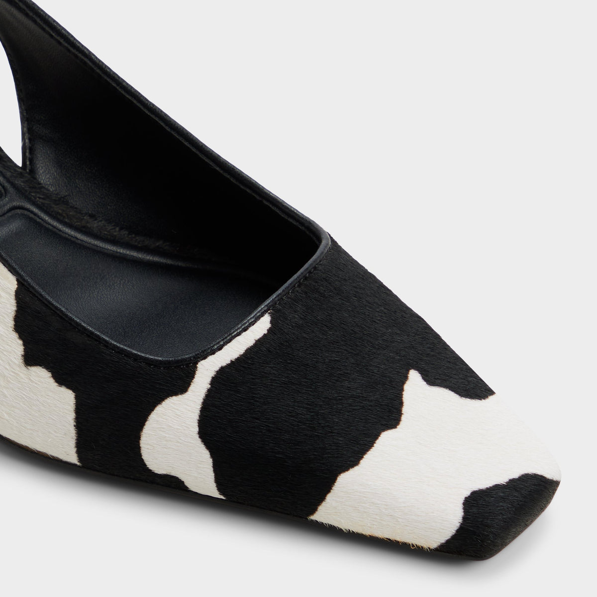 Close-up of the White/black Gabriellie Slingback kitten heel
