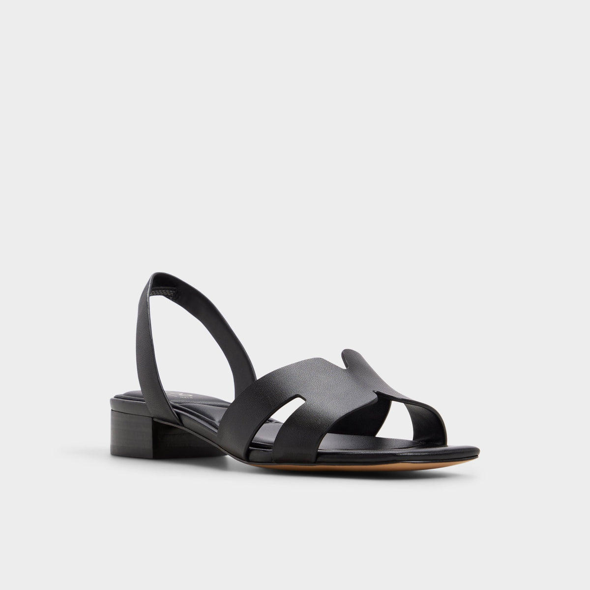 Three-quarter angle of Black Javamannon Strappy heeled sandal's front side