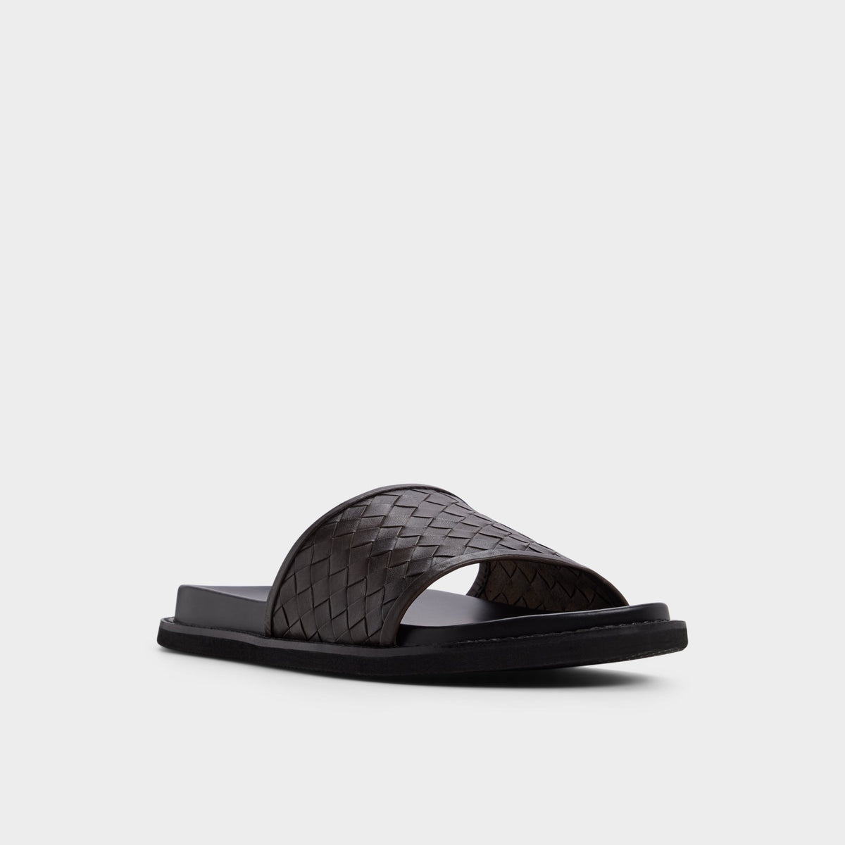 Three-quarter angle of Dark brown Fonti Slide sandal's front side