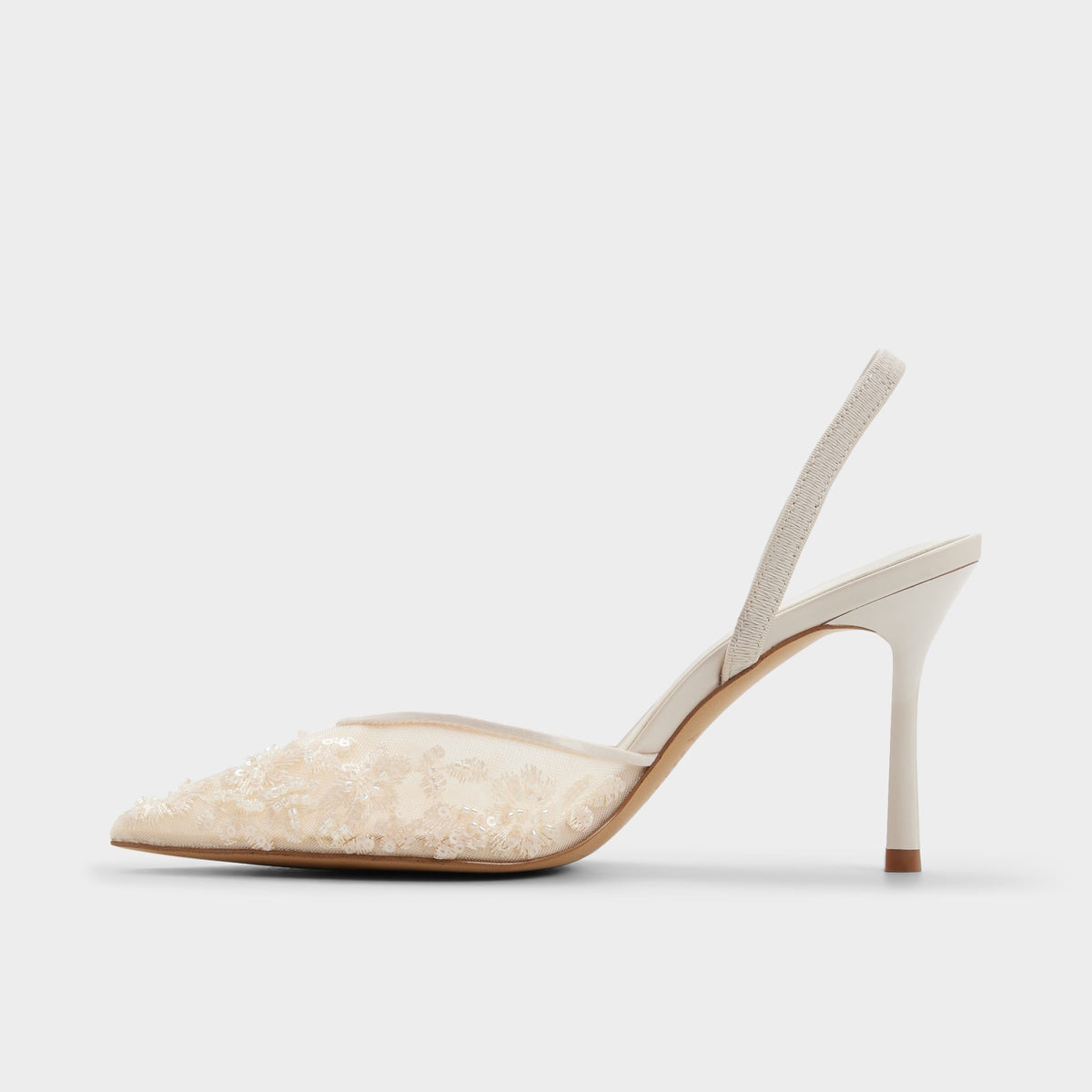 Side view of Cream Carollina Slingback high heel