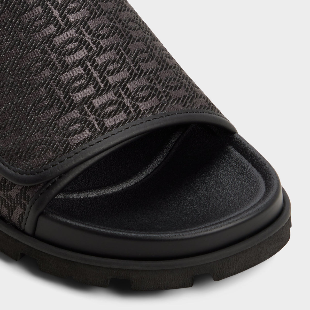 Close-up of the Black Orian Slide sandal