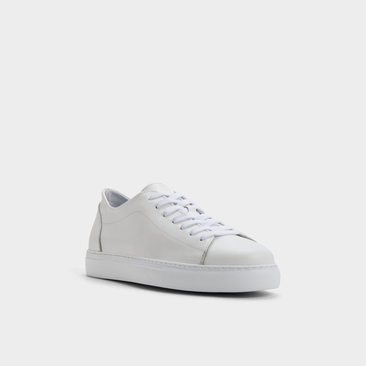 Three-quarter angle of White Hawke Low top sneaker's front side
