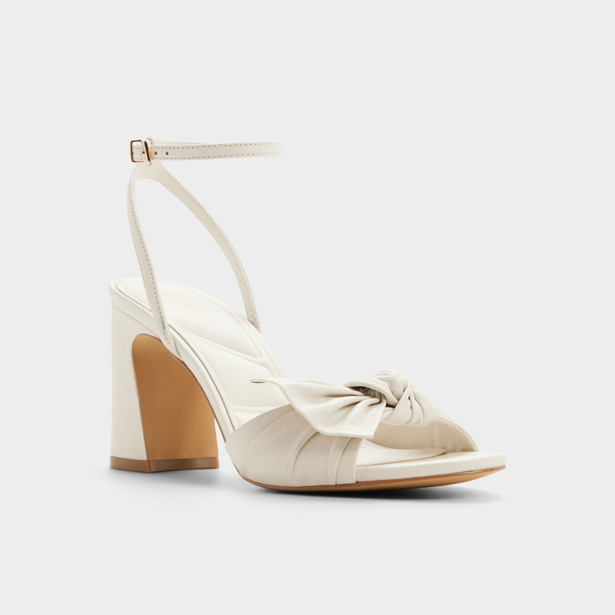 Three-quarter angle of Open white Angelknot Strappy heeled sandal's front side