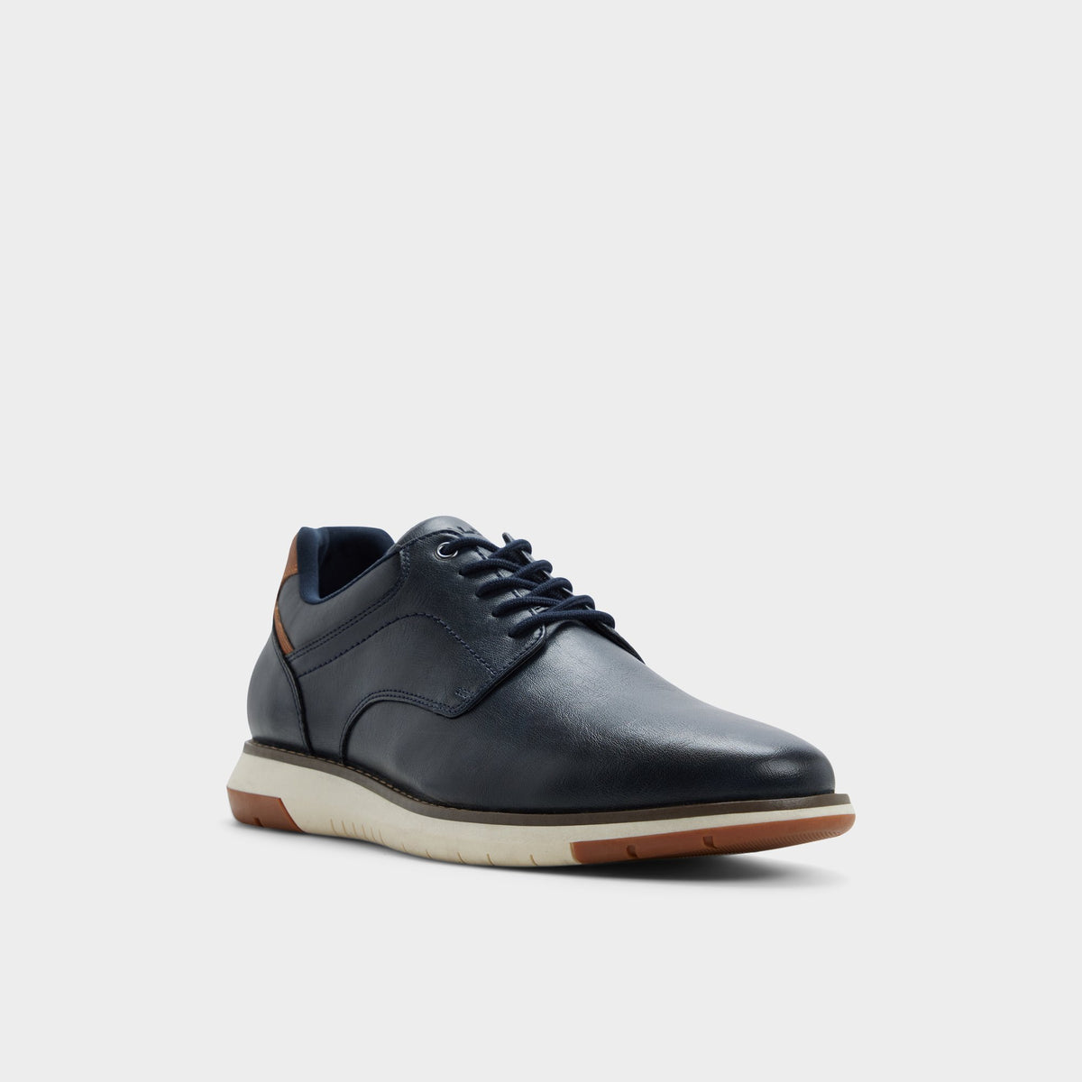Three-quarter angle of Navy Kaplan Oxford shoe's front side