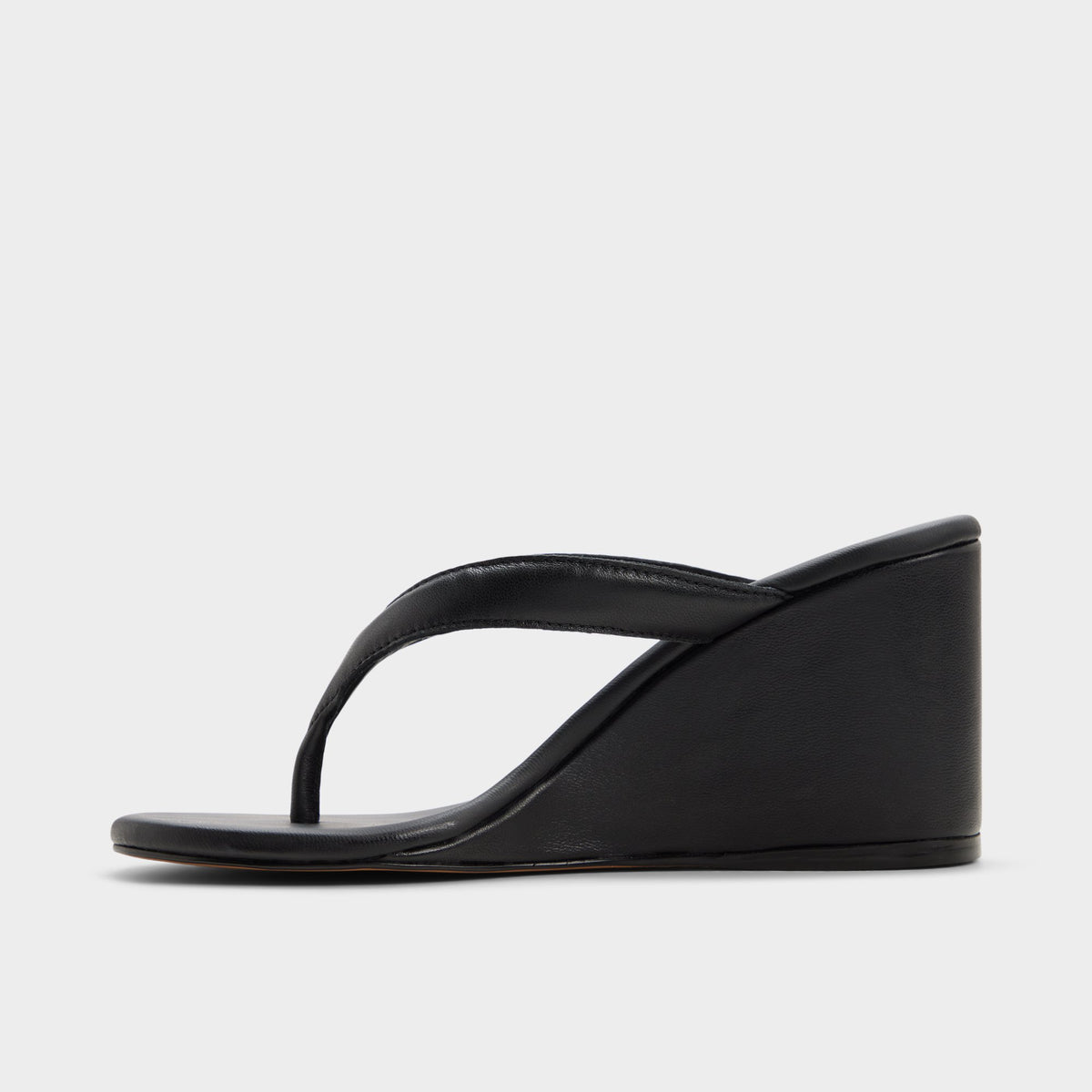 Side view of Black Isabelia Wedge thong sandal