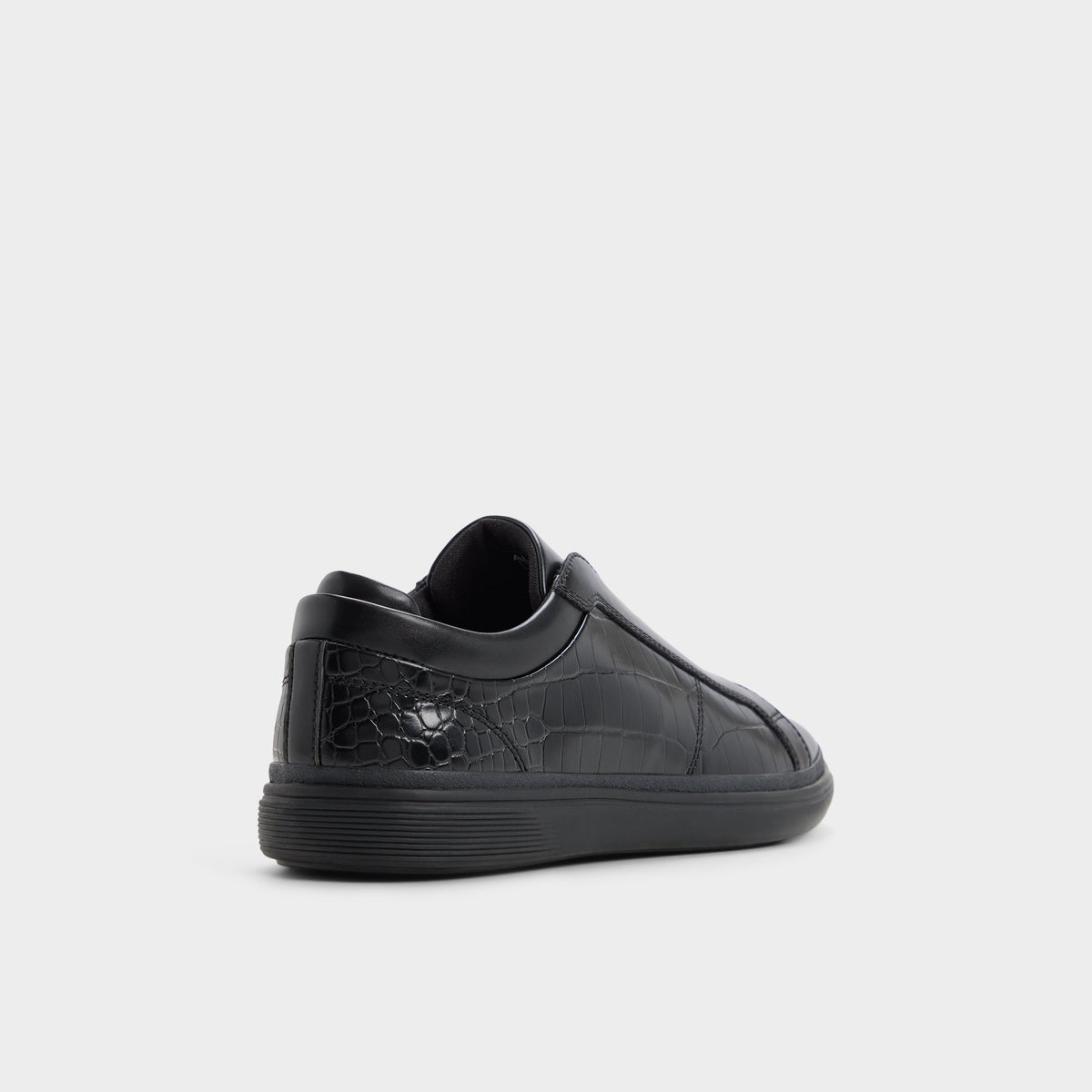 Three-quarter angle of Black/black Aros Slip-on sneaker's back side