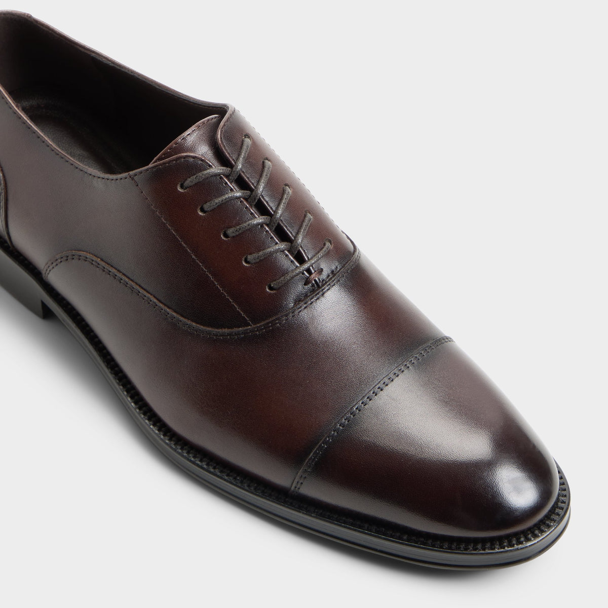 Three-quarter angle of Dark brown Fez Oxford shoe's front side