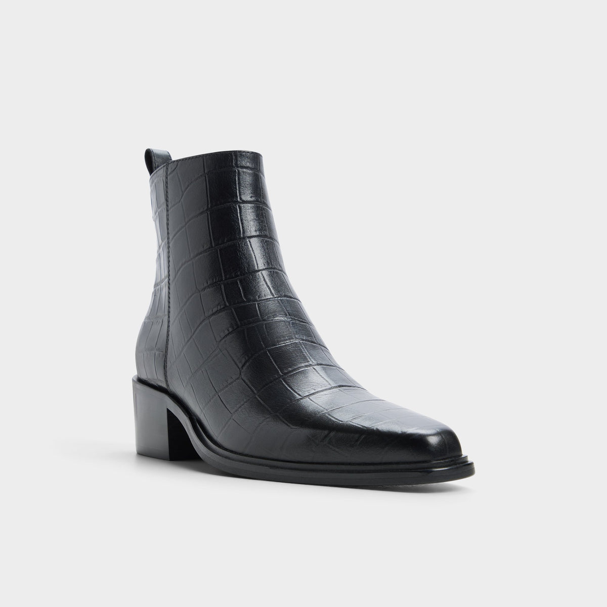 Three-quarter angle of Open black Brazos Ankle boot's front side