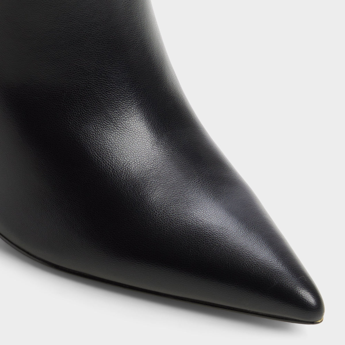 Close-up of the Other black Holiis Stiletto heel knee-high boot