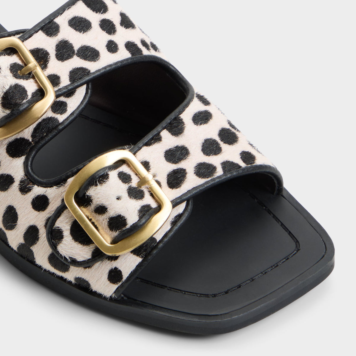 Close-up of the Cream multi Oria Slide sandal
