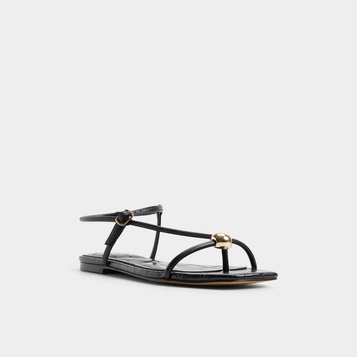 Three-quarter angle of Black Zaelle Strappy flat sandal's front side