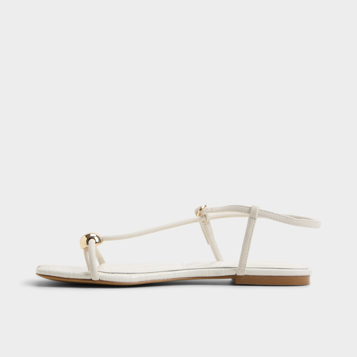 Side view of White/bone Zaelle Strappy flat sandal