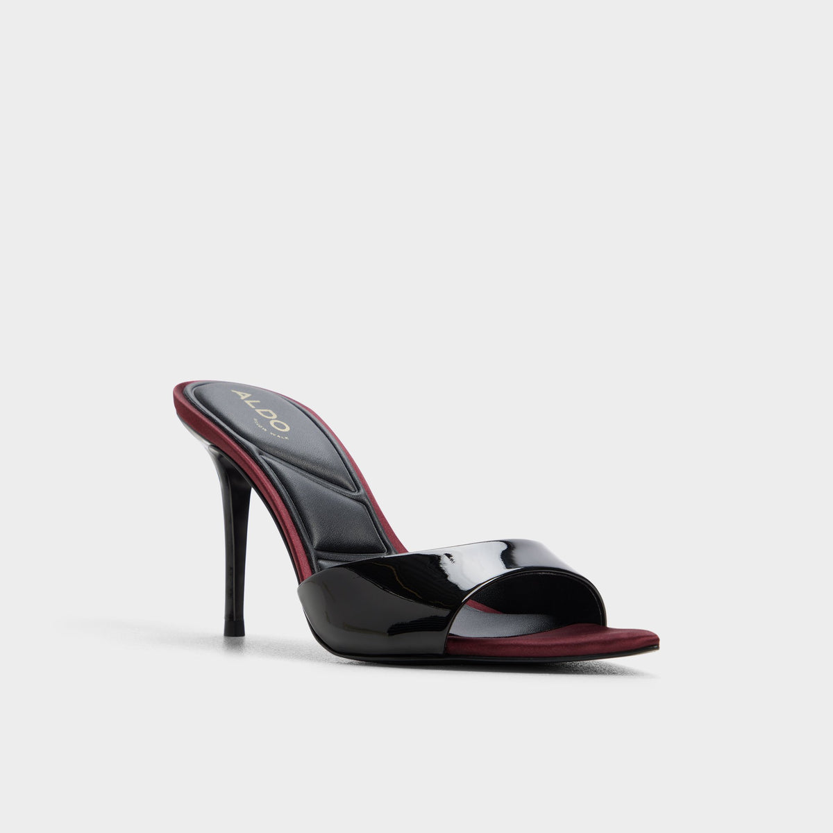 Three-quarter angle of Black combo Reanna Heeled mule's front side